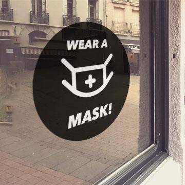 Black window cling with white "Wear a mask!" lettering - FoodSignPros