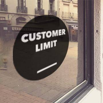 Black window cling with white "Customer Limit" lettering - FoodSignPros